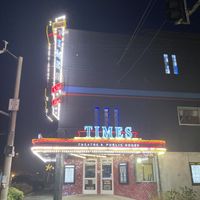 exterior (retrofitted movie theater turned brewery and sports bar)  at Sisu Beer in Seaside