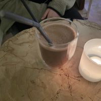 Cacao with fresh fruit at ONE Cacao Coffee Shop in Riga