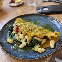 Chickpea based crepe appetizer with spinach and beans. My favorite thing I tried there!  at Le Rouge-gorge Restaurant in Menton