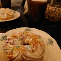 Donut with gold, sprinkles and plantbased whipped cream at Nomi the Karakal in Malmo