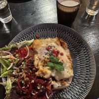 Lasagne and rose vanilla latte  at Nomi the Karakal in Malmo