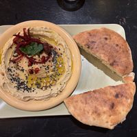 Hummus with pita  at Nomi the Karakal in Malmo
