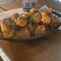 Cauliflower wings with a cheesey nooch sauce  at Cornish Arms in Brunswick