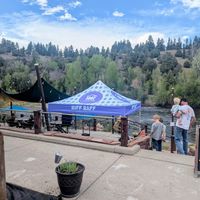 Riverfront seating and dog beach at Riff Raff Brewing Company in Pagosa Springs