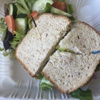 Tasty sandwich on whole wheat bread with mustard, avocado and all the veggies with a side salad. I skipped the dressing cause I wasn’t sure if it was vegan   at Depoe Bay Coffee in Auburn