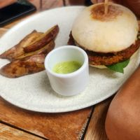 Hamburguesa un poco pequena (carne de lentejas, muy sabrosa) at Munchies Brunch in Santa Marta