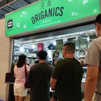 Long queue  at Origanics - 启点 - Sengkang Grand Mall in Northeast Singapore