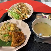 Drunken fried rice (the best, particularly the crispy side that comes with it!), Pad Thai, and a complimentary soup broth   at V Street - Emsphere in Bangkok
