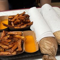 Fries and wrapped naan  at Naanwich'riz in Lyon