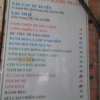 Menu on wall. In Vietnamese only at Dì Sáu in Ho Chi Minh City