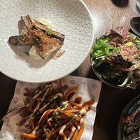 Eggplant & tofu fish, salad leaves, sweet potato fries  at Boom Boom Room in Brisbane