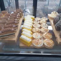 Salted caramel and chocolate tart; Passionfruit+mango mousse cake; Lemon meringue tart; Blackforest egg at GingerSnap Patisserie in West Melbourne