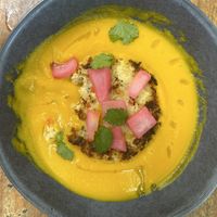 Hearts of palm cake with carrot crema purée Yum!  at Pico Bistro Tamarindo in Tamarindo