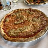 Margherita con porcini  at Hotel Dolomiten Ristorante Pizzeria in Dobbiaco
