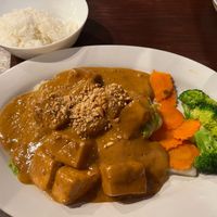 Amazing Praram with Tofu- Thick sauce, ground peanut, coconut milk, curry paste, served on a bed of steamed mixed vegetables at Ayuttaya Thai Cuisine in Ocala
