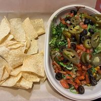 Vegan rice bowl. Tofu and variety of veggies and beans at Moe's Southwest Grill - SW Archer Rd in Gainesville