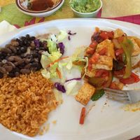 Half eaten tofu fajitas! at Fidelina's Taqueria in Ellensburg