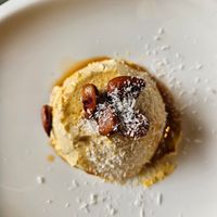 PannaCotta di carote e cardamomo con cocco e mandorle at Alchimia Vegetale in Pontassieve