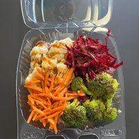 Salad! This is the Aurora Bowl - Brown rice, miso gravy, steamed broccoli and cauliflower, shredded beets and carrots - topped with peanut sauce!  at Soulstice Tea Room & Noshery in 100 Mile House