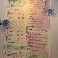 Wall menu for smoothies and ☕️   at APM Coffee in Boston