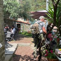 Trekking hikers on the most beautiful trails of the Cinque Terre at Volastra at Chiosco del Sole Volastra in Riomaggiore