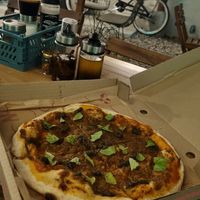 Microdosis pizza. at Nomada   in Santa Marta