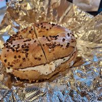 Onion bagel with tofu scallion cream cheese at Bagels & Co in New York City
