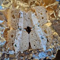 Onion bagel with tofu scallion cream cheese at Bagels & Co in New York City