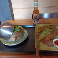 Bro-shi-to and mushroom lover dumplings with spicy tomato sauce and side of edamame at Daily Dumpling in Berlin
