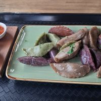 various dumplings with creamy mint and spicy tomato dip at Daily Dumpling in Berlin