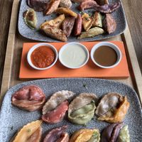 32 dumplings and 3 dips  at Momos - Organic Veggie Dumplings in Berlin