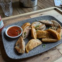 Mushroom and sweet potato fillings with the spicy dip at Momos - Organic Veggie Dumplings in Berlin