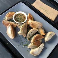 Fried dumplings with soy-sesame at Momos - Organic Veggie Dumplings in Berlin