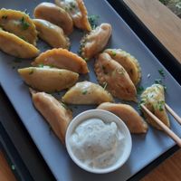 "Hot Potato" and "Cheeky Chickpea" dumplings, steamed, with lemon-mint dip at Daily Dumpling in Berlin
