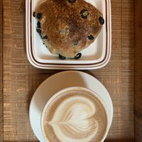 Olive ciabatta and oat latte  at Ashville Bakery Cafe - 애쉬빌 베이커리 카페 in Seoul