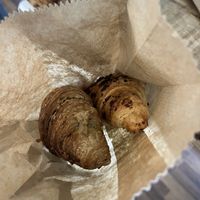 Croissants (1 de melocotón, aloe y cúrcuma, otro de chocolate)  at NaturalMente - Italian Coffee Shop in Toledo