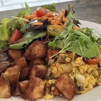 Tofu scramble with salad and crispy potatoes   at Peacock Pansy in San Francisco