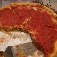 Deep dish with "sausage" and "pepperoni " at Kitchen 17 in Chicago