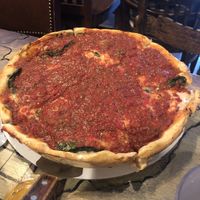 Traditional deep dish with spinach at Kitchen 17 in Chicago