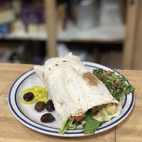 Mini Hummus Wrap. Honestly an okay wrap, something I could make at home. at Caffe at Amy's in Buffalo