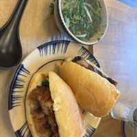 Pork belly banh mi and pho broth side   at Sen Saigon in New York City