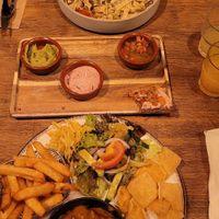 dinner, carbonara and satay bowl, with leftover dips from our appetizer at avant garden in Maastricht
