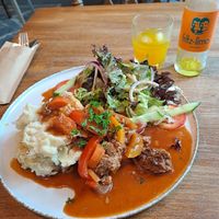 Goulash with mash and salad. at avant garden in Maastricht