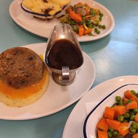 Standard size shepherds pie main (back) and haggis and mash starter (front) with extra veg side at MUMS Great Comfort Food in Edinburgh