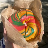 Rainbow bagel with strawberry tofu cream cheese - filling was amazing, bagel not so much!  at Liberty Bagels - Wall Street in New York City