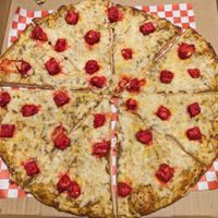 curry sauce, vegan cheese, and vegan tandoori chicken at Fusion Curry Pizza in Portland