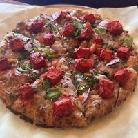 Chick'n curry pizza with curry sauce at Fusion Curry Pizza in Portland