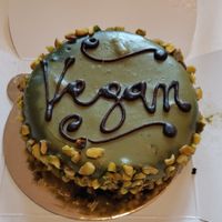 A beautiful pistachio cake! at Ko.bo Vegan in Milan