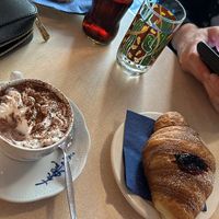 Soy cappuccino, vegan croissant and vegan cookie. at Cìciri in Brescia