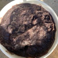 Refried black beans  at Tacos A Go Go - Midtown in Houston